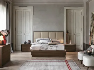 Letto Prestige con testiera imbottita rivestita in ecopelle di Tomasella
