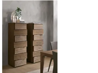 Madia scultura di design in legno intagliato in modo da creare un motivo alternato, quasi ondulatorio Tiffany di Pacini e Cappellini